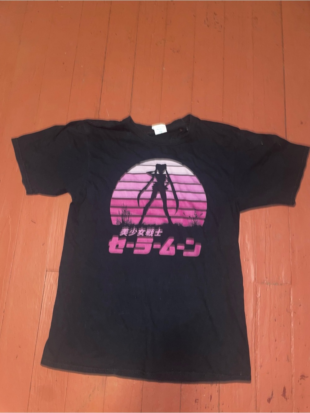 Black Sailor Moon graphic tee with pink gradient sunset vintage